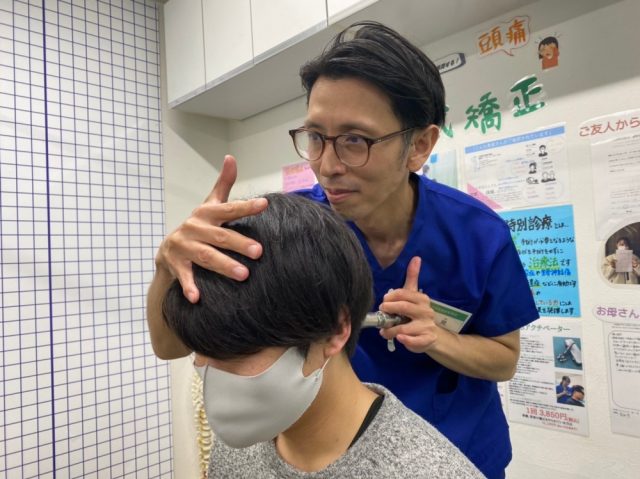 体の歪み 写真